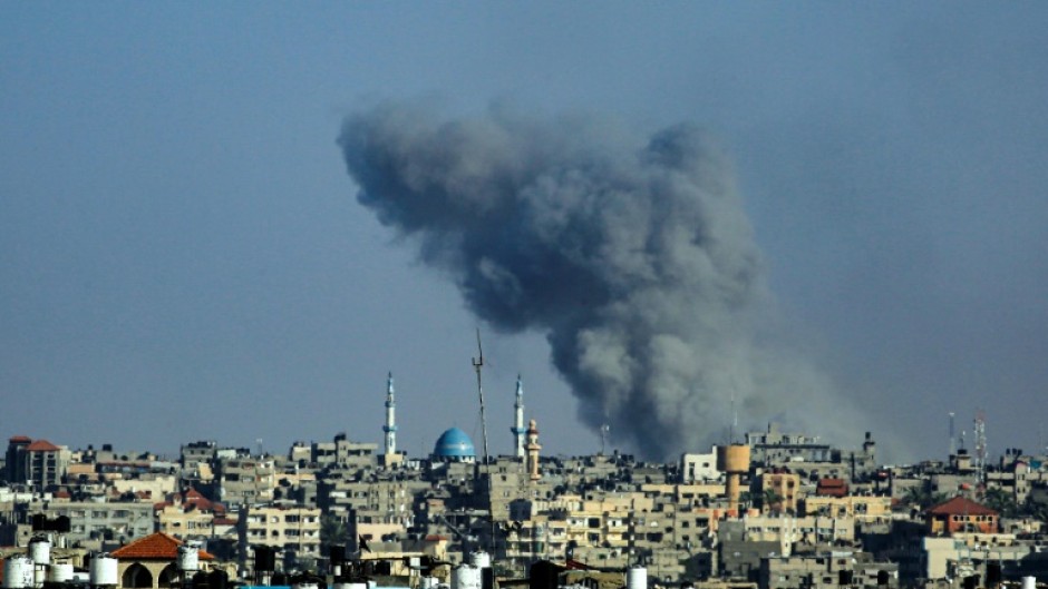 Smoke billows following Israeli bombardment in Rafah in the southern Gaza Strip on May 25, 2024