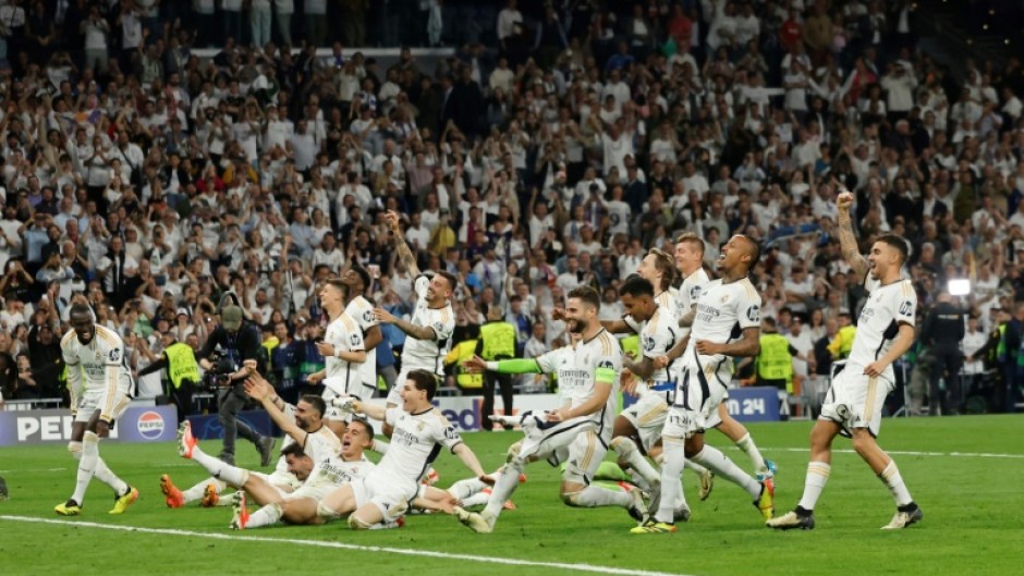 Real Madrid's players celebrate beating Bayern Munich at the Santiago Bernabeu to reach the Champions League final