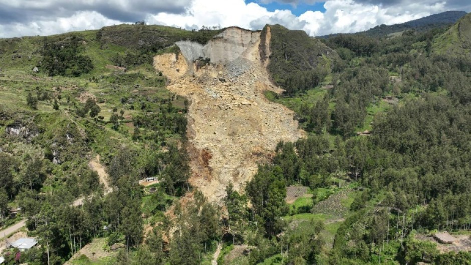 This aerial view taken on May 27, 2024 shows a general view of the area affected by a landslide the region of Maip Mulitaka, in Enga Province, Papua New Guinea.