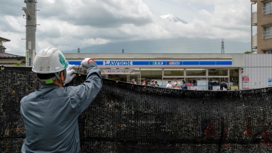 The barrier was put up a week ago in a popular photo spot by authorities in Fujikawaguchiko town