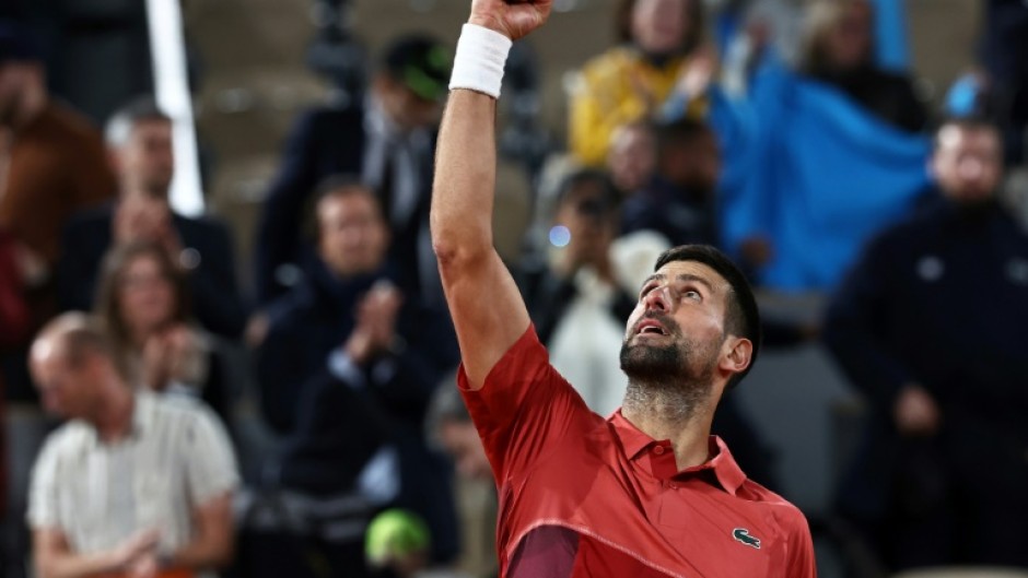 Winning moment: Novak Djokovic celebrates vicotry over Pierre-Hugues Herbert