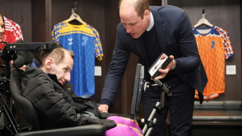 Prince William meets with Rob Burrow (L) at Headingley Stadium in 2024