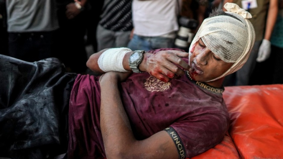 A youth wounded in an Israeli bombardment at Bureij is treated at the Al-Aqsa Martyrs hospital in central Gaza