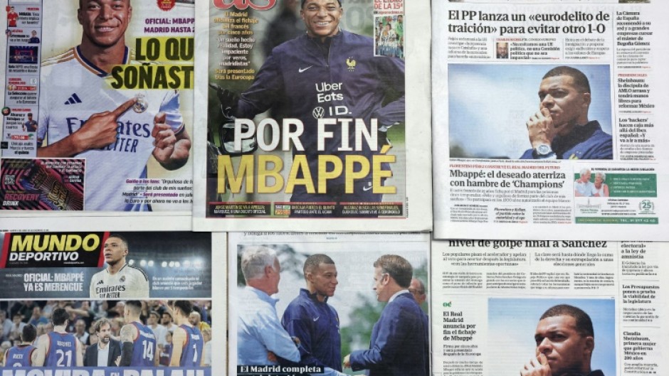 This picture taken on June 4, 2024 shows several Spanish newspapers' front pages a day after French forward Kylian Mbappe signed for Real Madrid