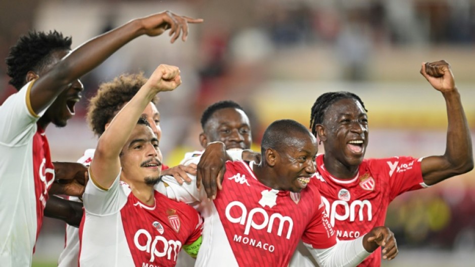 Monaco's Malian midfielder Mohamed Camara (2R) taped over an anti-homophobia logo in their final Ligue 1 game of the season against Nantes on May 19