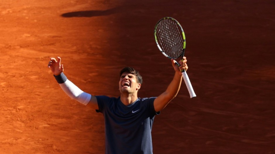 Carlos Alcaraz is the youngest man to reach Grand Slam finals on all three surfaces