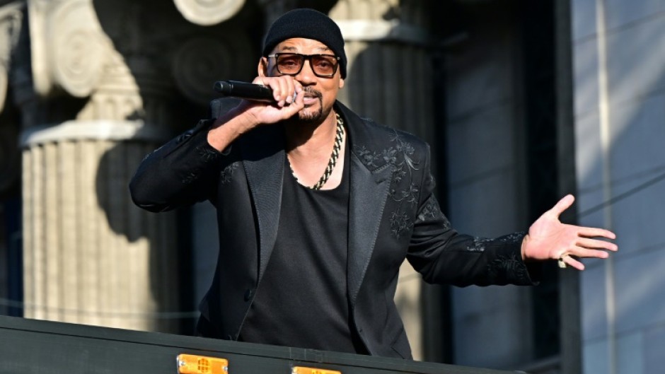 US actor Will Smith raps from a bus at the premiere of 'Bad Boys: Ride or Die' at the TCL Chinese Theatre in Hollywood, California