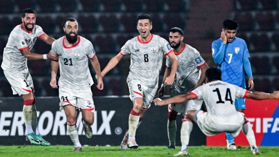 Afghanistan celebrate scoring against India earlier this year