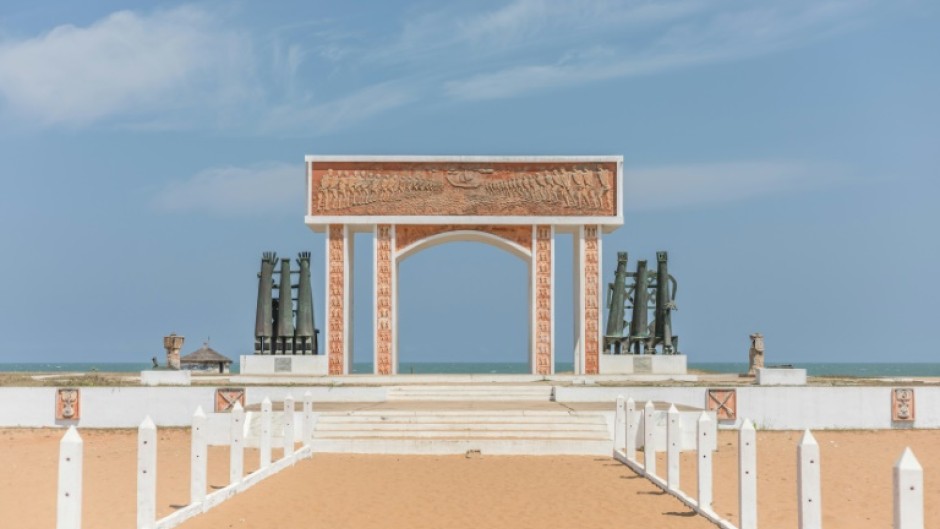 Ouidah is scattered with memorials to the slave trade like the "The door of no return" where slaves departed on ships