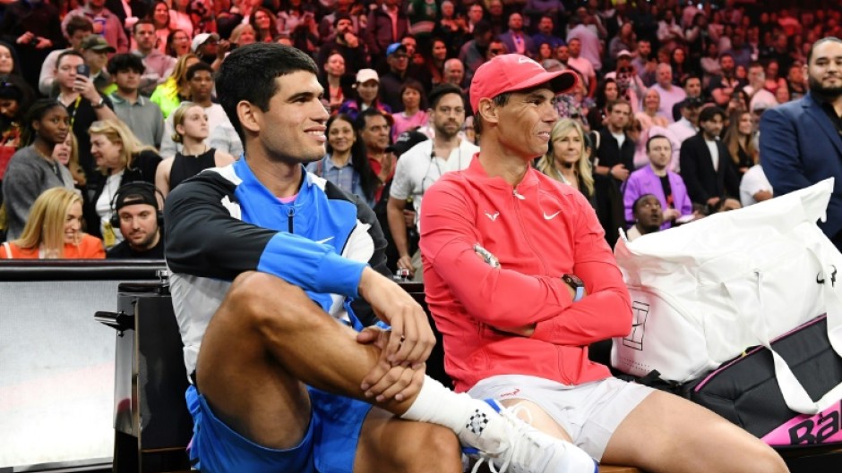 Carlos Alcaraz (L) and Rafael Nadal (R) will be lining up next to each  other at the Paris Olympics 