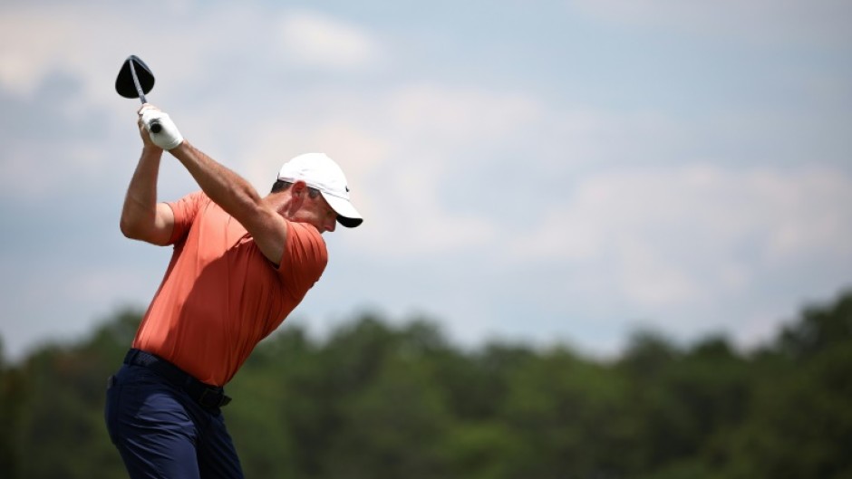 World number three Rory McIlroy of Northern Ireland shared the lead when he teed off in Friday's second round of the 124th US Open at Pinehurst