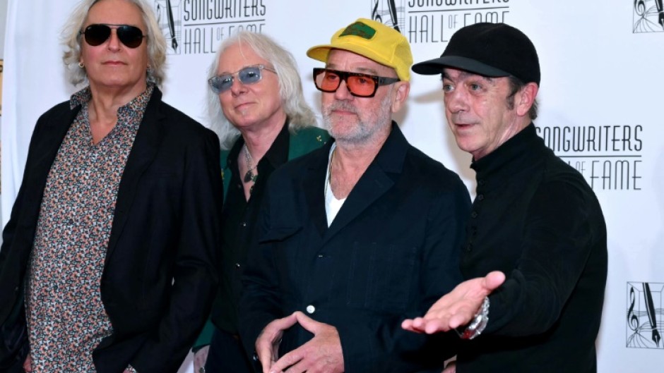 R.E.M. band members Peter Buck, Mike Mills, Michael Stipe and Bill Berry attend the Songwriters Hall of Fame 2024 induction and awards gala, where they delivered a surprise performance