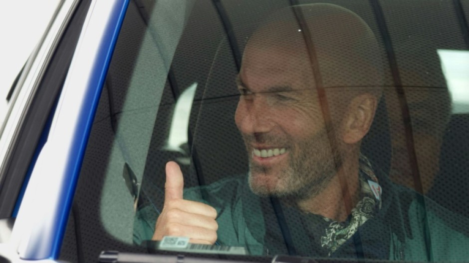 Zinedine Zidane all smiles before joining an illustrious list of ceremonial Le Mans starters including Steve McQueen and Brad Pitt 