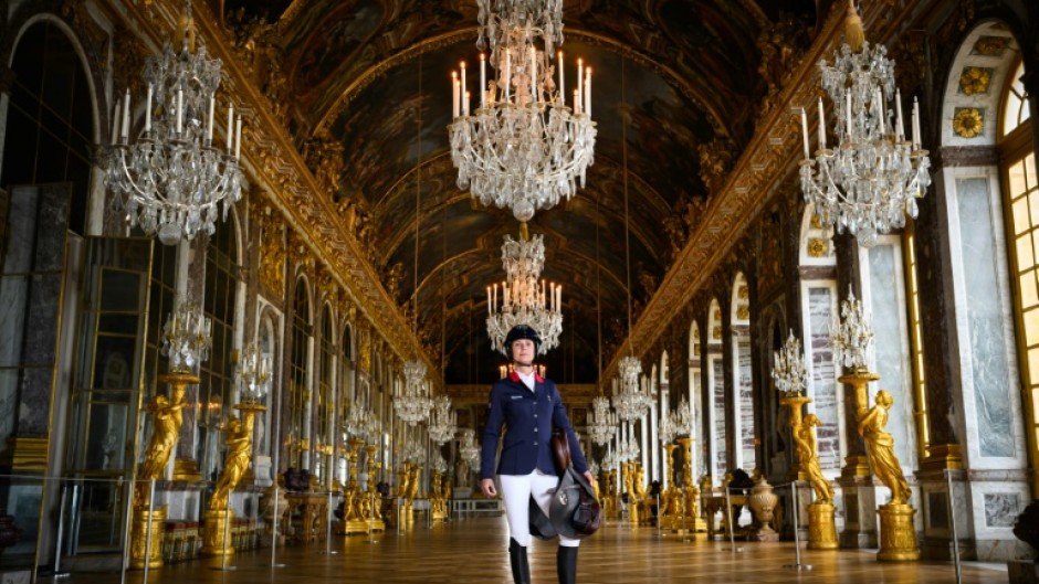 French equestrian Penelope Leprevost in the Hall of Mirrors at Palace of Versailles