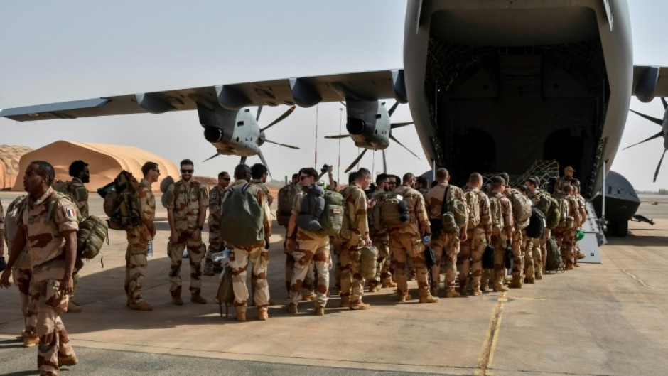 The last French soldiers board a French military plane to leave Niger on December 22, 2023