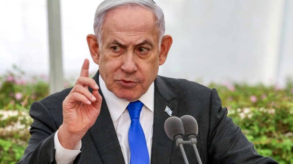 Israeli Prime Minister Benjamin Netanyahu, shown during a ceremony on June 18, 2024, has vowed to remain in Gaza 'until all of the hostages return'