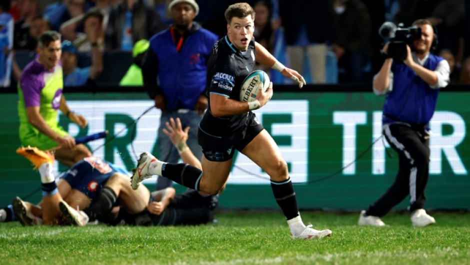 Glasgow Warriors centre Huw Jones scores the try that won the United Rugby Championship final against the Bulls in Pretoria.  