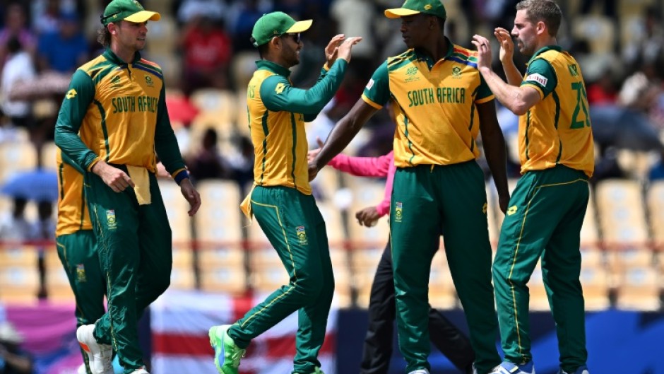 Joy of victory: South Africa celebrate their Super Eights win over England in a T20 World Cup match in St. Lucia 