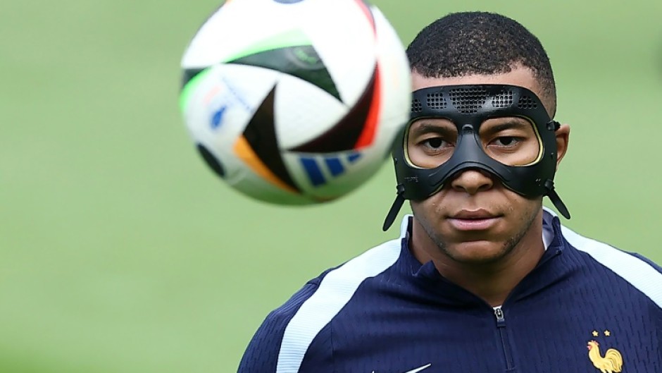 Kylian Mbappe sports a mask in training on Sunday. Could the France captain play against Poland on Tuesday?