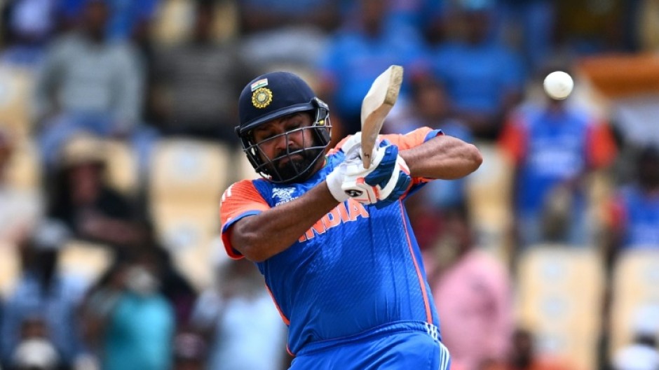 On the attack: India captain Rohit Sharma hits a four during his 92 against Australia in a T20 World Cup Super Eights match in St. Lucia