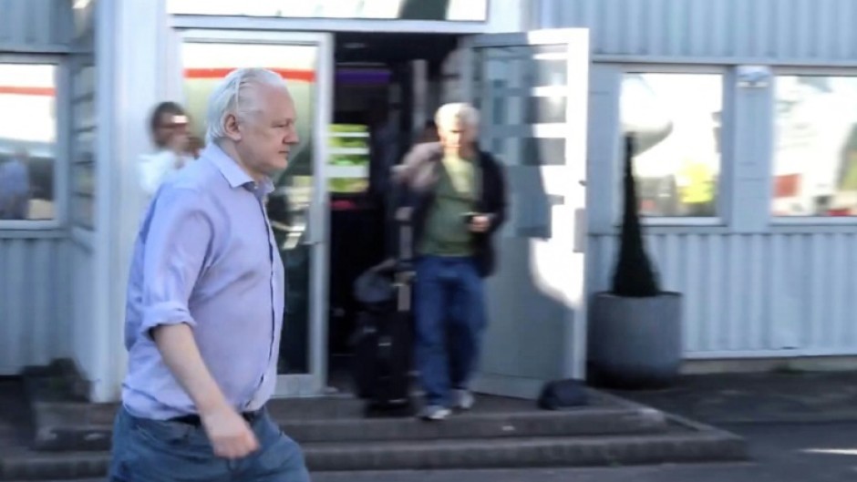 This screenshot courtesy of WikiLeaks's X page shows Julian Assange walking to board a plane from London Stansted Airport on June 24, 2024