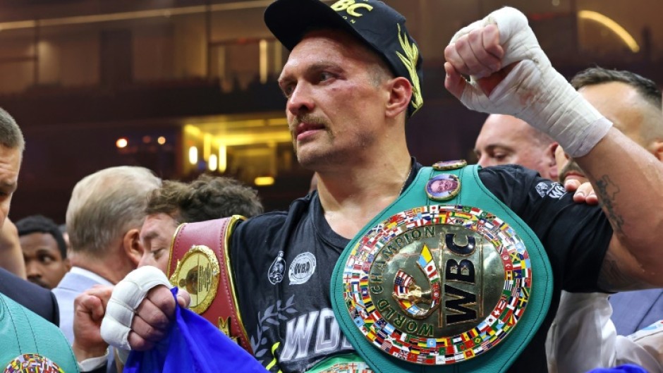 Oleksandr Usyk celebrates his victory over Britain's Tyson Fury in Riyadh