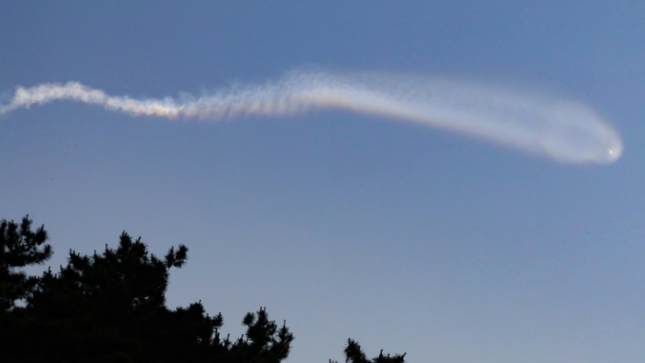 A vapour trail believed to be created by a North Korean ballistic missile is seen from South Korea's Yeonpyeong island on Wednesday