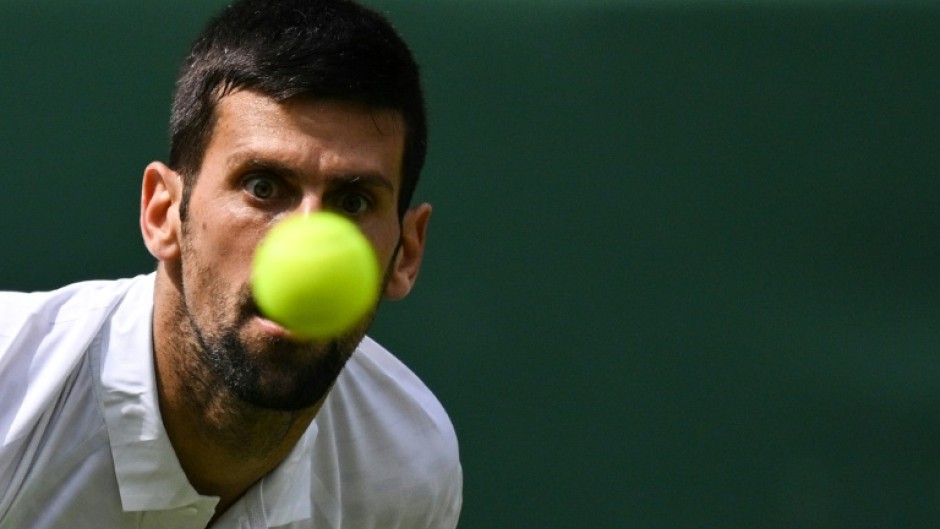 Senior service: Novak Djokovic in action during last year's final against Carlos Alcaraz 