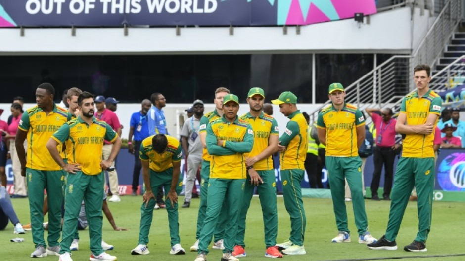 South African players wait on the field after losing the T20 World Cup final to India