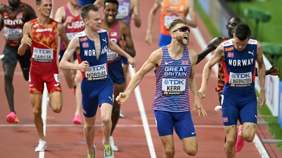 Britain's Josh Kerr celebrates winning the men's 1500m final at the World Athletics Championships