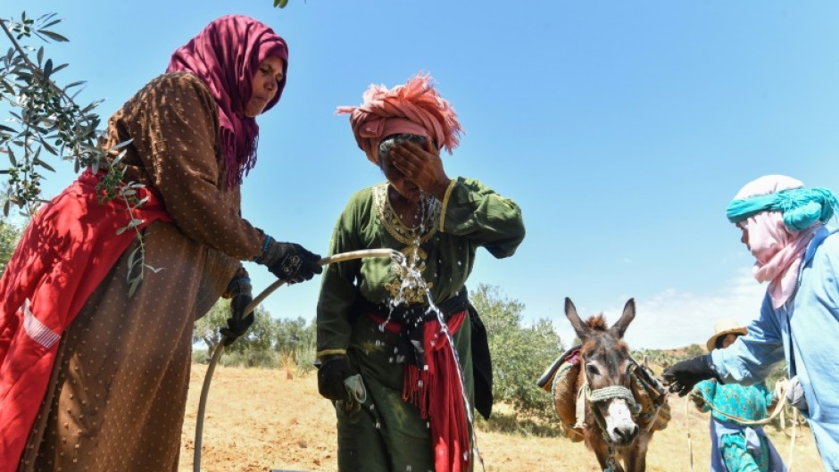 'Most families come to fetch water while we're working, and sometimes we can't do both,' said Djaouher Kammoun, a 26-year-old farmer