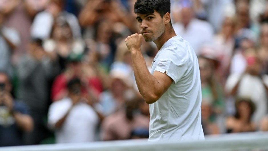 Champion: Carlos Alcaraz celebrates winning against Mark Lajal in the first round 