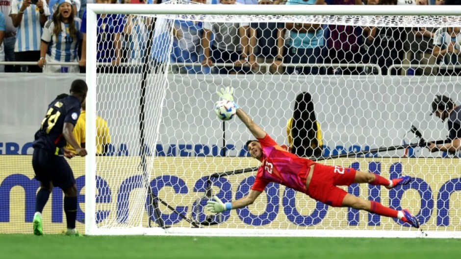 Argentina goalkeeper Emi Martinez saves from Ecuador's Alan Minda in Thursday's Copa America quarter-final thriller