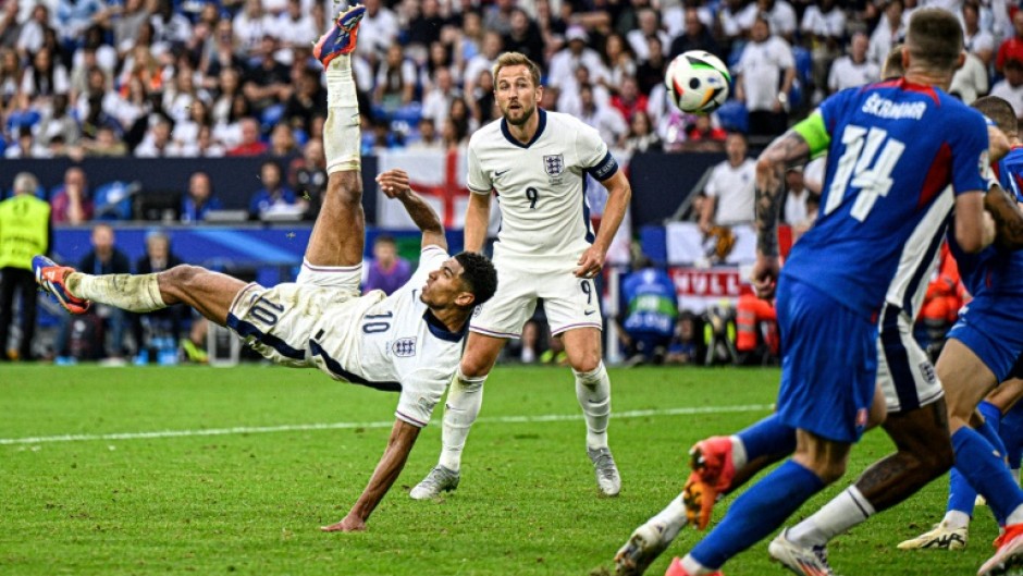 England's Jude Bellingham (left)is free to play against Switzerland after only receiving a suspended ban and fine for his gesture against Slovakia