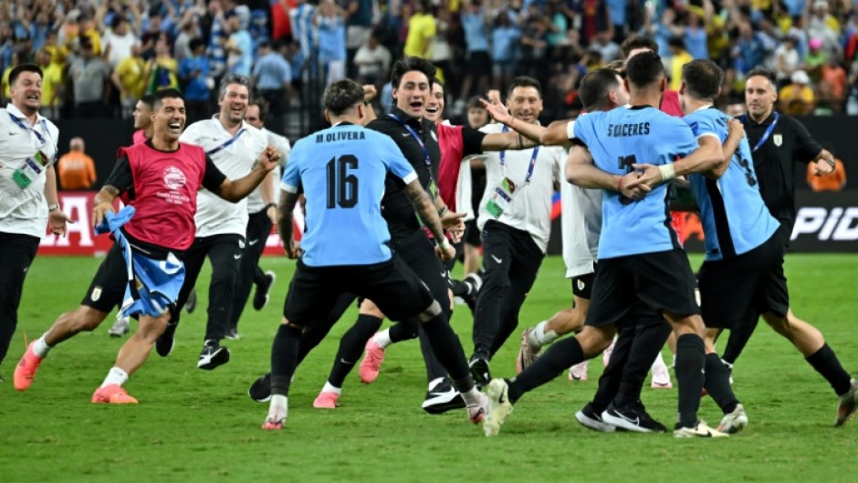 Uruguay celebrated a penalty shoot out victory over Brazil in their Copa America quarter-final on Saturday.