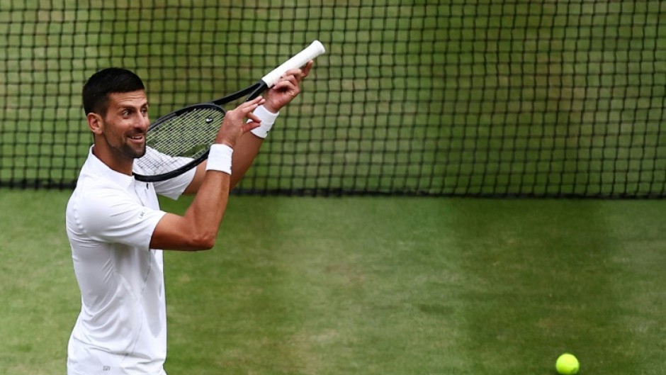 Alcaraz has 'charisma': Novak Djokovic imitates playing the violin at the end of Friday's semi-final win over Lorenzo Musetti