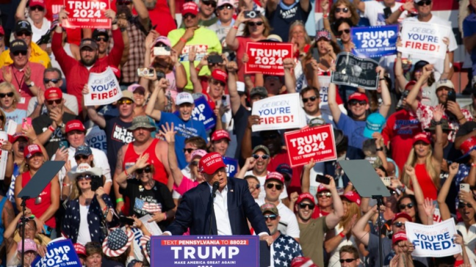 Former US President Donald Trump speaking moments before shots were fired at a rally in Pennsylvania