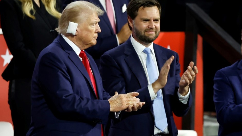 US presidential candidate Donald Trump next to his running mate J.D. Vance. AFP | KAMIL KRZACZYNSKI