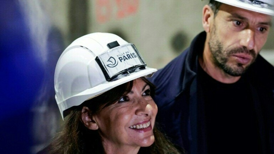 Paris mayor Anne Hidalgo (L) will take a long-awaited dip in the Seine with chief Olympic Games organiser Tony Estanguet (R)