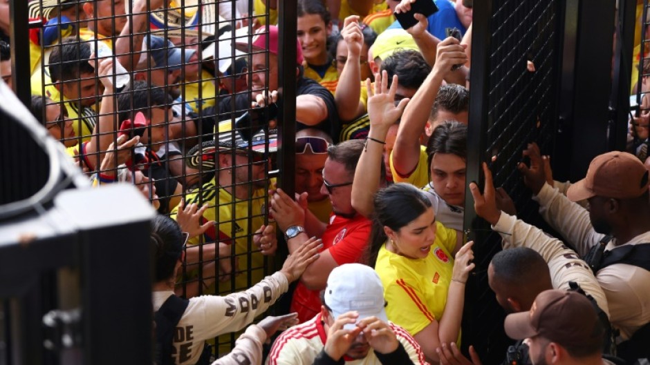 Fans are caught in a crush during chaotic scenes before the Copa America final in Miami