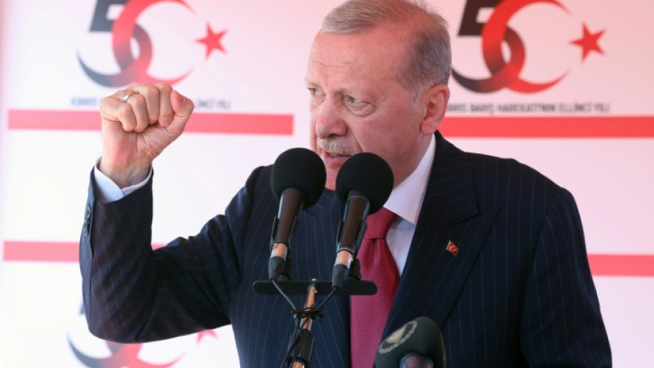 Turkish President Recep Tayyip Erdogan speaks during a ceremony in breakaway Turkish Cypriot statelet in the island's north