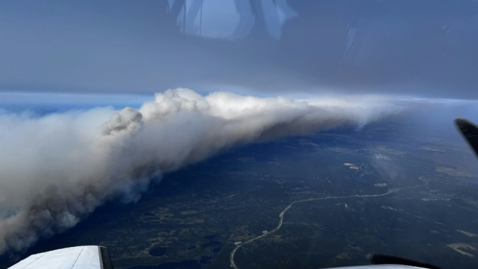 A July 12, 2024 aerial view of a wildfire near Canada's northeastern town of Wabush