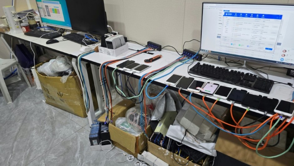 A handout photo from the Presidential Anti-Organized Crime Commission shows computers and mobile phones at a scam centre in Bamban