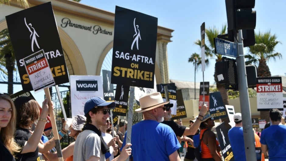 Members of the SAG-AFTRA actors' union demonstrate outside Paramount Studios in Los Angeles on July 14, 2023