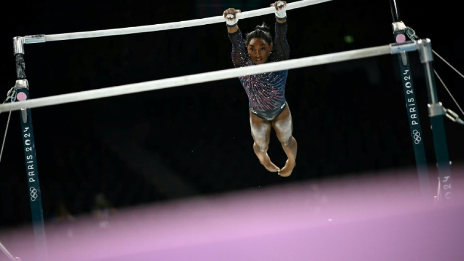 Four-time Olympic gold medallist Simone Biles trains on uneven bars in the run-up to the Paris Games