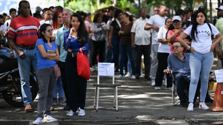 Venezuelan President Nicolas Maduro reacts after results were announced in Caracas in the country's presidential election, in which Maduro was declared the winner and opposition groups protested