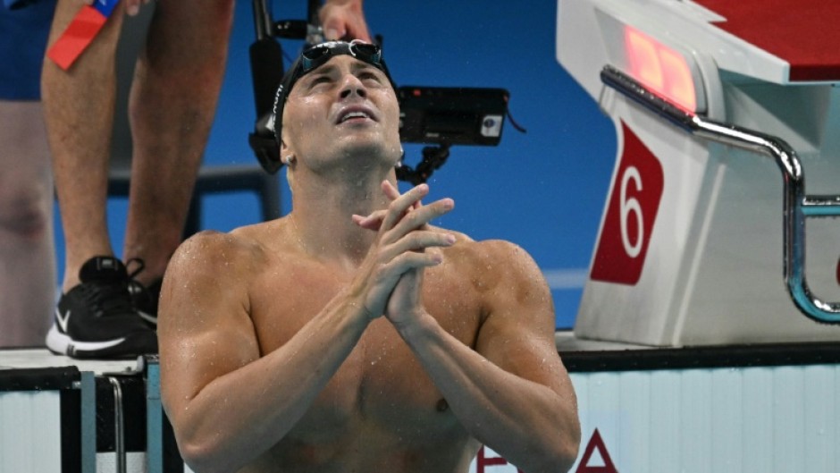 Italy's Nicolo Martinenghi celebrates after winning men's 100m breaststroke gold at the Paris Olympics