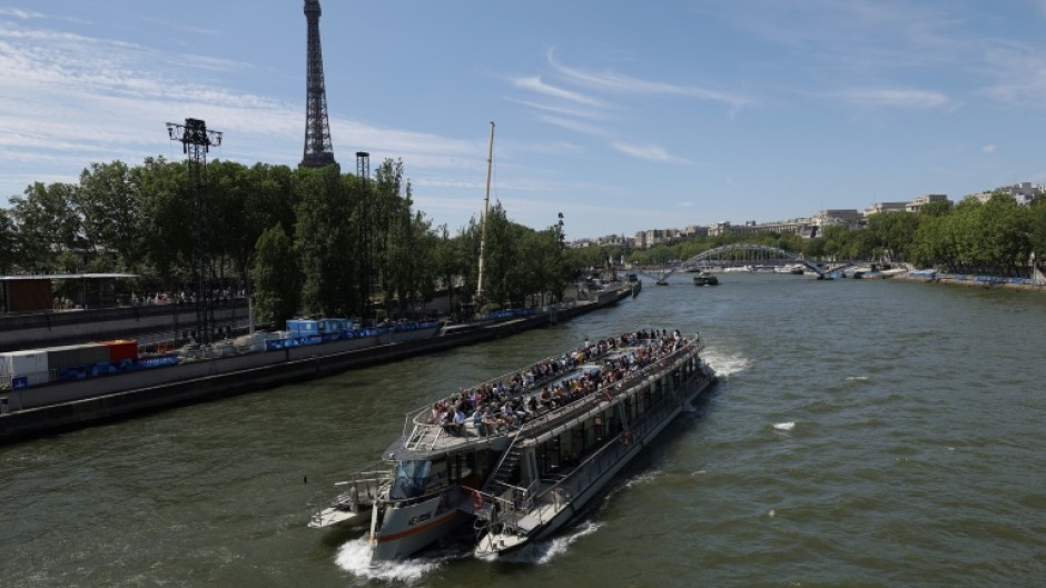 A tourist boat on the Seine river in Paris which is due to hold the swimming event in the Olympic triathlon