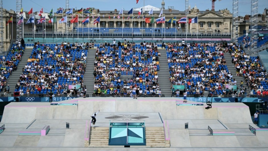 Mariah Duran competes in the women's street skateboarding preliminaries with Place de la Concorde as the backdrop