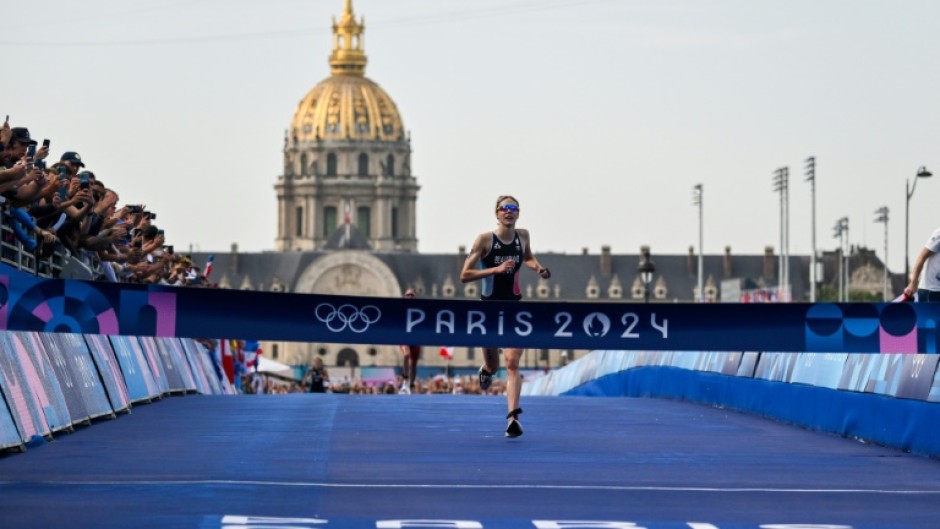 France's Cassandre Beaugrand pulled away from the field to win the women's triathlon on home soil